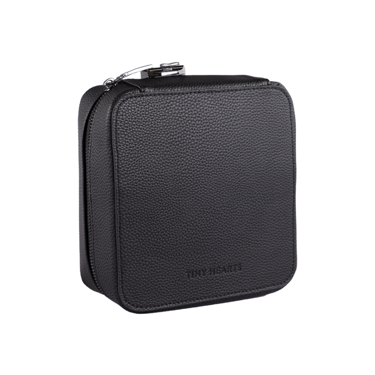 A black medication bag with a zipper, branded by Tiny Hearts, designed for carrying child medication.
