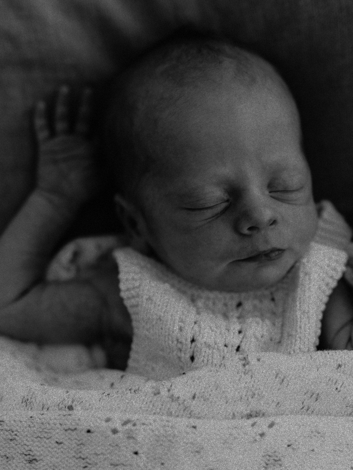 A sleeping newborn baby